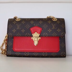 Louis Vuitton Victoire leather bag